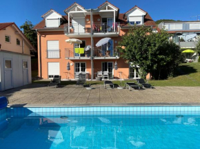 Die Seeblume - Ferienwohnung mit Pool und Seeblick